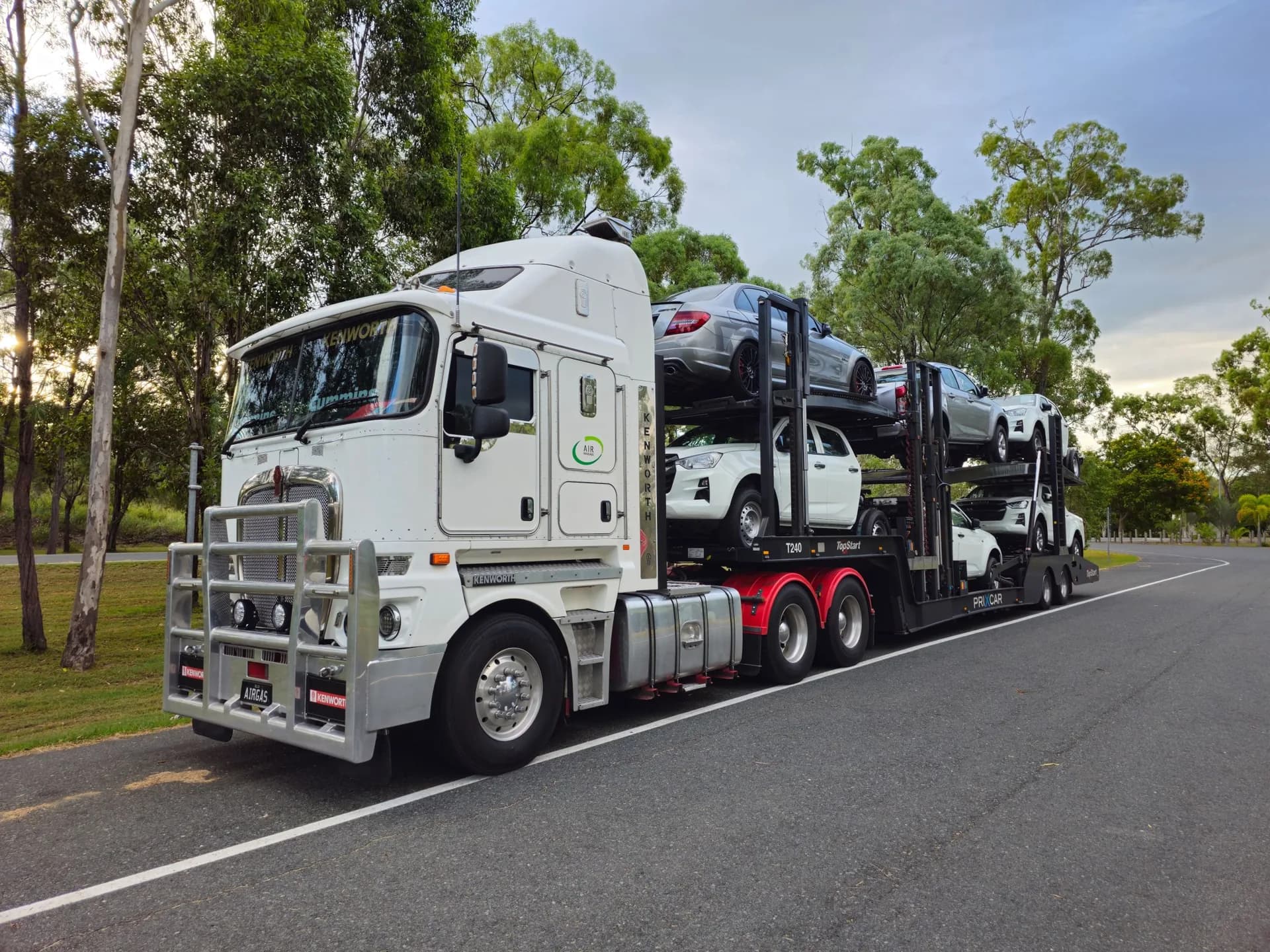 Car carrier truck loaded with cars on the road